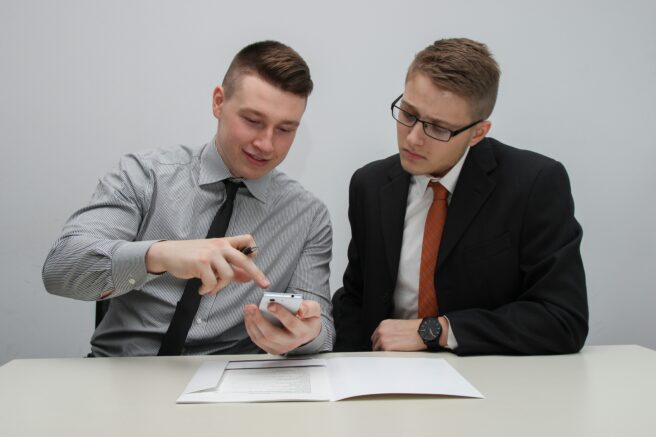 Two People Reviewing A Cv